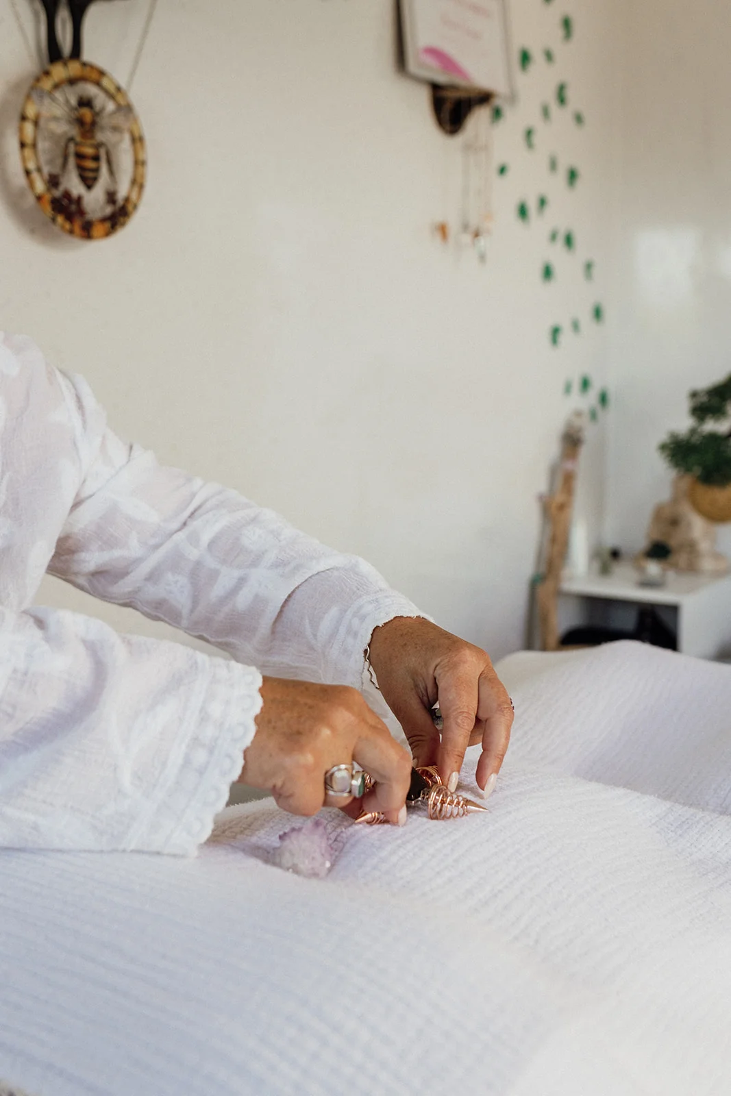 A crystal healing therapy session with a client relaxing